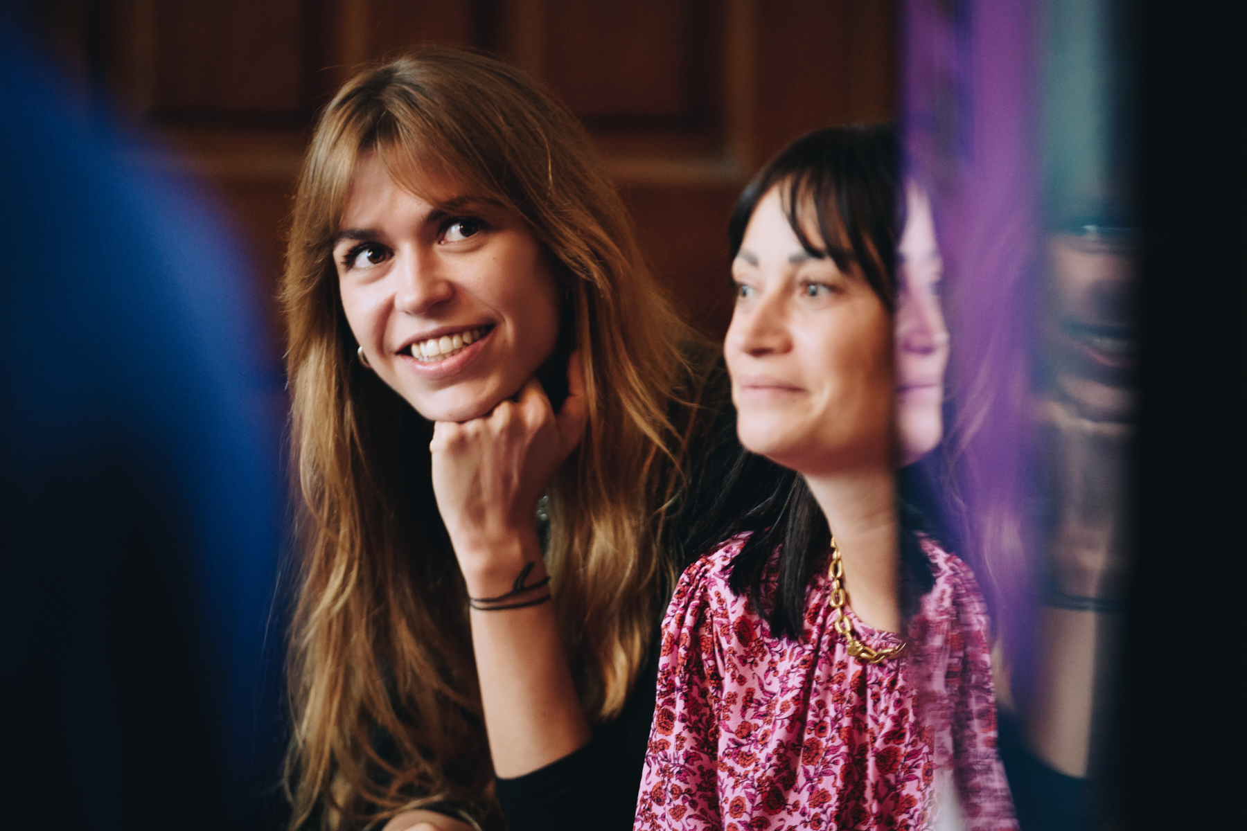 Event Photography - Turn Moments into Memories, Capture Your Business Milestones Smiling women at a corporate event captured by Morax Studio